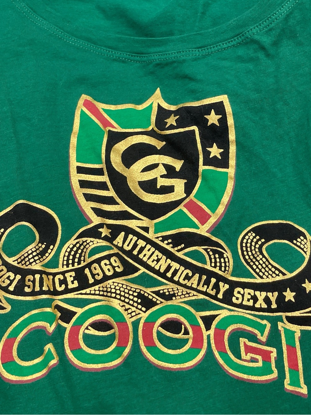 COOGI Green Short Sleeve Tee with Gold Red and Black Crest